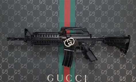 gucci golden gun|Gucci gun meaning.